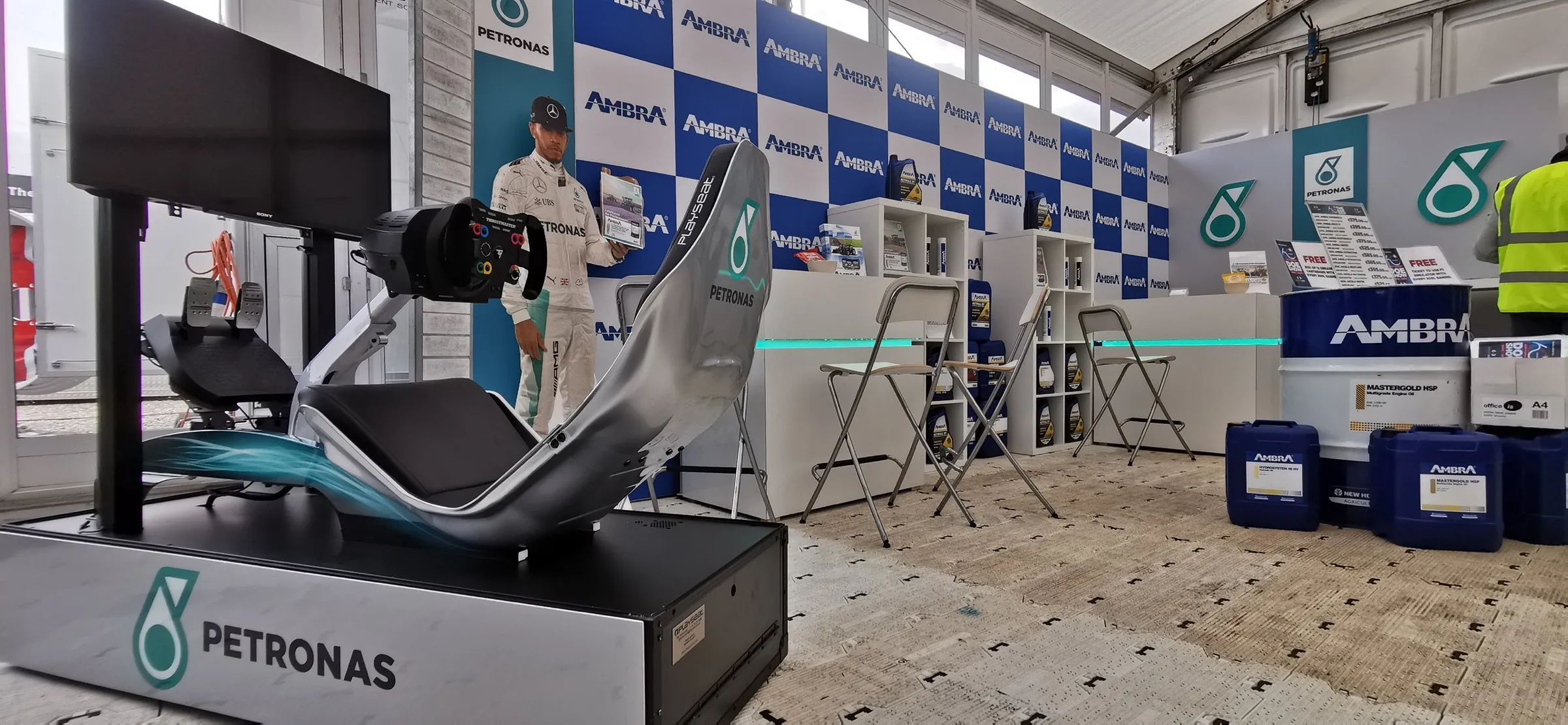 Racing simulator in a full Petronas brand wrap